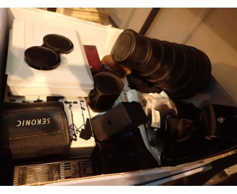Mixed camera accessories including Yashica lens cover and filters