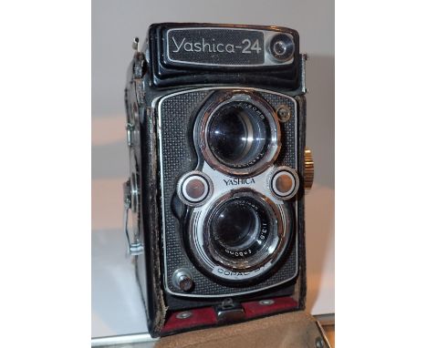 Yashica 24 camera in a hard leather case 