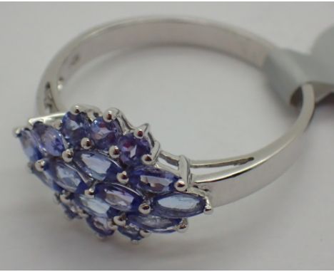 Previously owned but unused 14ct white gold fancy tanzanite ring size R