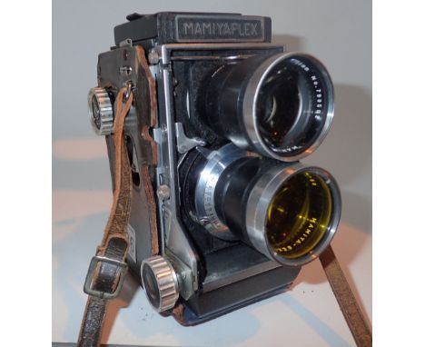 Mamiyaflex camera with Mamiya-Sekkor lenses in a leather case 