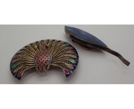 Silver and enamel leaf brooch and a peacock brooch 