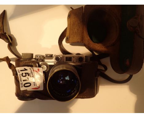 Leather cased Nikkor camera 