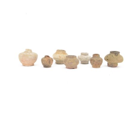 Antiquities; collection of seven small terracotta pottery vessels, including examples from Nabataean, Hellenistic and similar