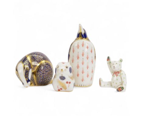 Four Royal Crown Derby paperweights, comprising Badger with gold stopper, Harvest Mouse with silver stopper, Teddy Bear no st