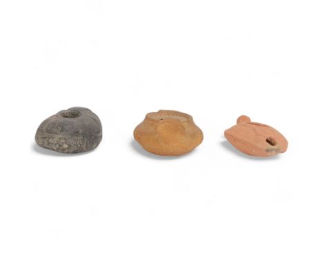 Antiquities; Byzantine zoomorphic oil lamp, together with two other oil lamps 