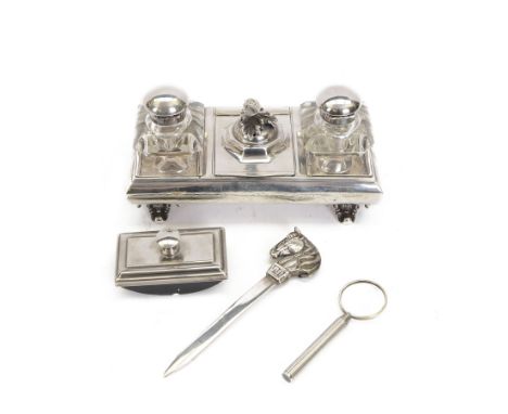 Silver plated desk stand, with three hinged compartments, two with recesses for glass inkwells and the central compartment wi