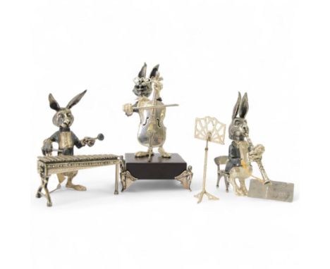 Three Alberty silver plated rabbit figures, modelled as musicians, comprising clarinetist,  xylophonist and cello player, H11