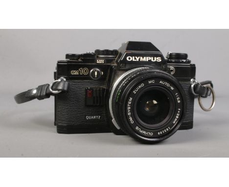 An Olympus OM10 Quartz SLR camera with Om-System Zuiko  1:28 f=28mm lens.  Shutter working.