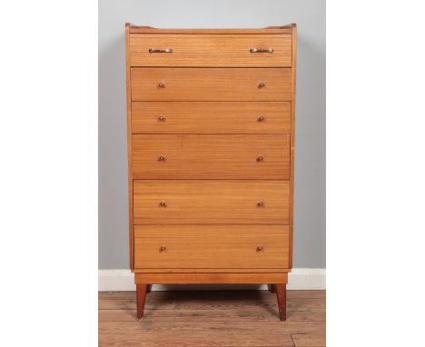A vintage teak Austinsuite tallboy chest of six drawers. Height: 115cm, Width: 64cm, Depth: 40cm.  