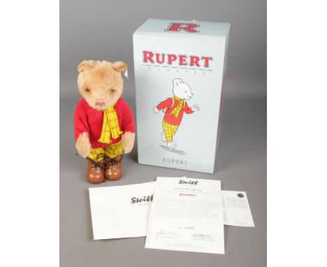 A boxed limited edition Steiff Rupert Bear 653599 with certificate of authenticity. No. 285/1973.  