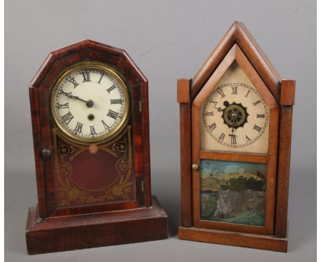 Two American clocks including 8 day wall clock and mantel clock examples.  wall clock example has loose door, needs repair