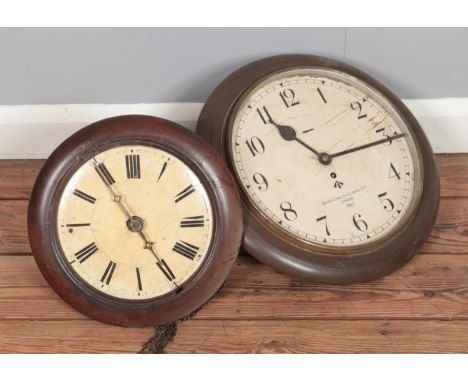 A Smith's wall clock with broad arrow mark, 1955, together with similar postman's alarm style clock.  Both clocks missing gla