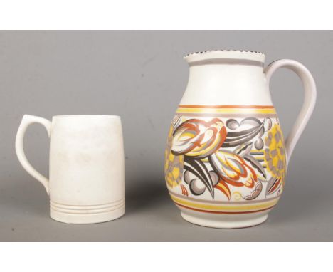 A Poole Pottery Carter Stabler Adams jug in the 484 shape and CF pattern, together with a Keith Murray for Wedgwood tankard. 