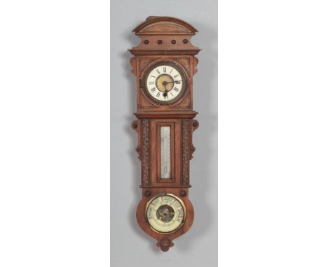 A Victorian walnut cased wall clock, thermometer and barometer, with white enamel dial set with Roman numerals.Hx64cm  