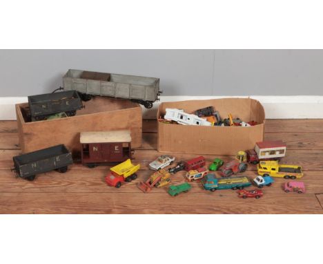 Two boxes of vintage model vehicles, to include wooden railway carriages and a selection of diecast cars from Dinky, Corgi an