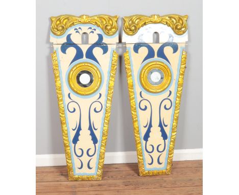 A pair of vintage fairground panels featuring gilt detail and central circular etched mirror. Approx. dimensions 122cm x 48cm