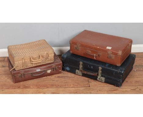 A collection of vintage travel suitcases to include Dreadnought and Revelation examples.  