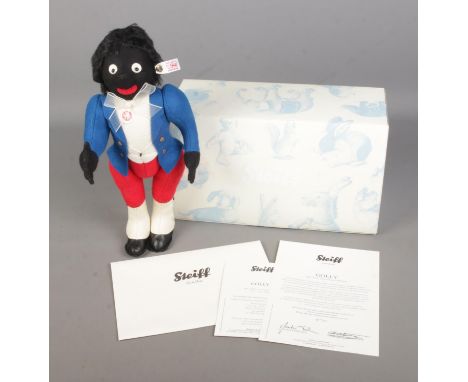 A boxed Steiff Limited Edition Golly (036033) with white ear tag, chest tag and certificate of authenticity. No 261/1909.  