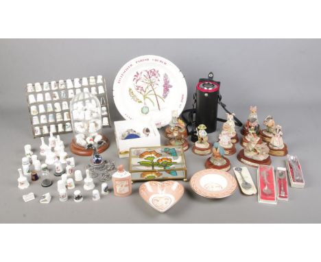 A box of assorted collectables to include Tudor Mint figures, Little Nook Village by The Leonardo Collection, large quantity 