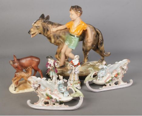 A collection of mostly ceramic figures to include 1930's plaster figure of boy and dog, Cortendorf deer and fawn, etc.  