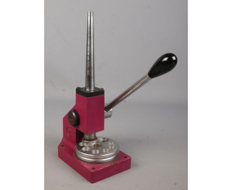 A cast iron ring stretcher.  