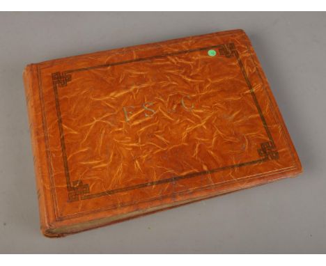 An album of late 19th/early 20th century including nautical theme, animals and architectural examples.  
