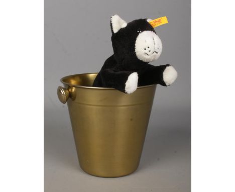 A Steiff Original 'Koko' cat, 281402, in gold effect ice bucket.  