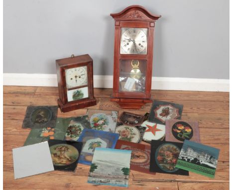A box of clocks and clock parts. Includes Lincoln 31 day wall clock, Ansonia mantel clock and collection of decorative Americ