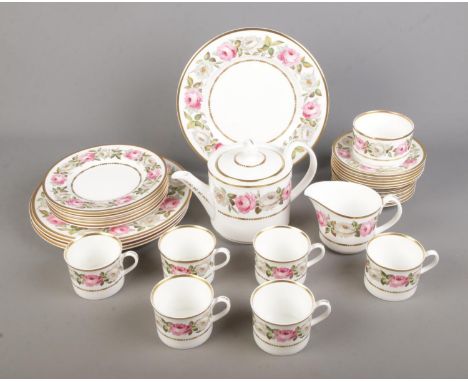 A collection of Royal Worcester tea wares in the Royal Garden pattern to include tea pot, milk jug, sugar bowl, etc. Approx. 