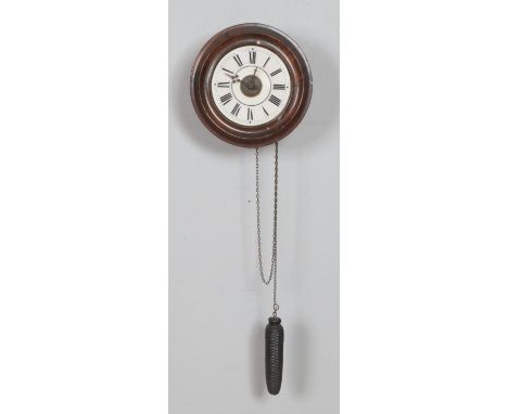A mahogany postman's alarm clock featuring enamel dial with roman numeral markers  