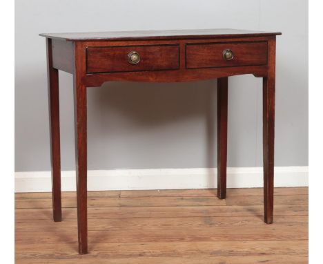 A Georgian Mahogany side table having two short drawers with brass ring pull handles.Hx75cmWx83cmDx43cm  