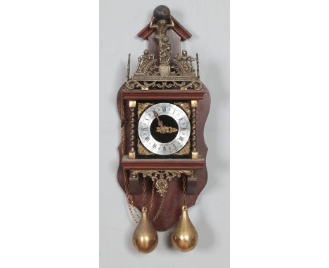 A Dutch brass and oak mounted wall clock, 20th century, the silvered dial with black Roman numerals to chapter ring, inscribe