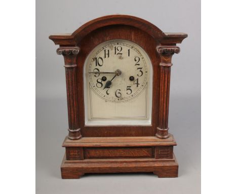 Wooden cased Victorian mantel clock and key with movement marked CB of Badische Uhrenfabrik  