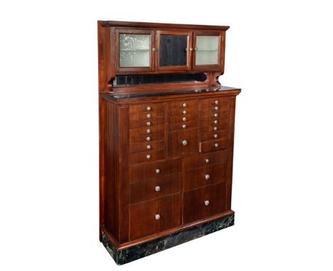 American Cabinet Company Mahogany Dental Cabinet  Mahogany case having veneered drawer fronts, a recessed upper cabinet havin