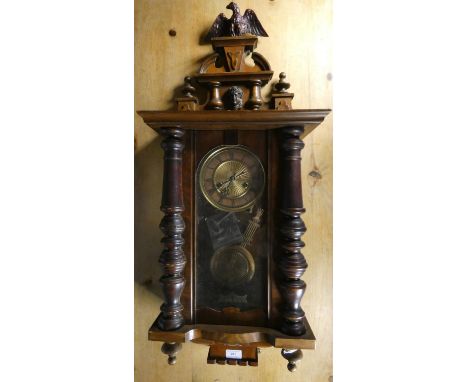 A Vienna style wall clock with architectural case, pendulum, key 
