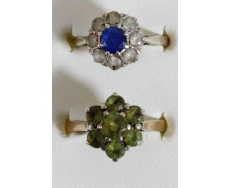 A 9ct gold peridot cluster ring, size P 1/2 and a 9ct gold paste cluster ring, size K 1/2, 5.7 gms. 