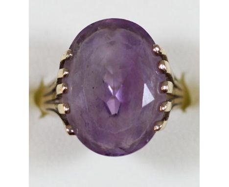 A 9ct gold and amethyst single stone dress ring, size M, 4 gms. 