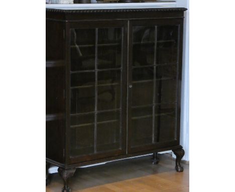 A Edwarian freestanding glazed book shelf 122 cm tall 105 cm wide 33 cm deep 