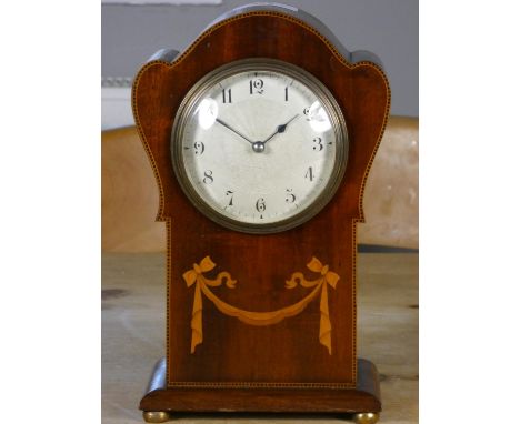 An Edwardian mahogany and boxwood inlaid mantle clock, silvered dial, French movement, 23 cm 