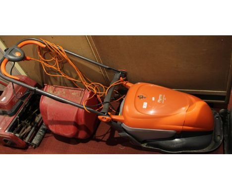 A Flymo hover mower together with a Suffolk Punch electric rotary mower (2) 