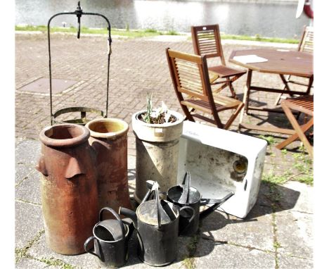 Three chimney pots, ceramic sink, three galvanized watering cans and a cast iron planter (8) 