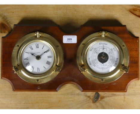 H. Samuel, a brass quartz bulkhead clock, 9cm dial mounted together with a barometer with port hole bezels 