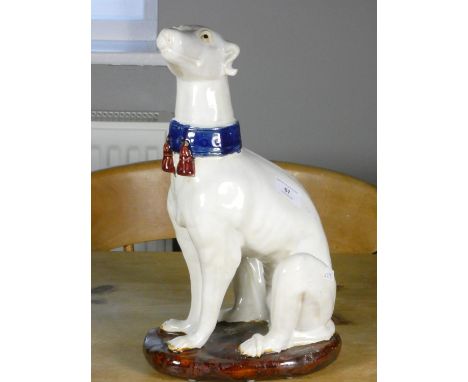 A ceramic model of a Greyhound, 36 cm tall 