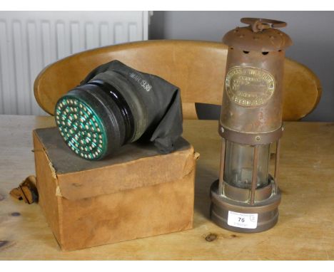 A Thomas and Williams miners lamp, together with a WWII gas mask (2) 