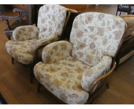 A pair of late 20th Century easy chairs, marked Ercol Furniture. seat height 43, height 56 cm (2) 