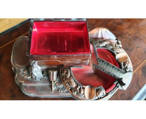 A Japanese metal musical box/smokers companion, in the form of a pagoda cigarette box and an ashtray (A/F), the movement by P