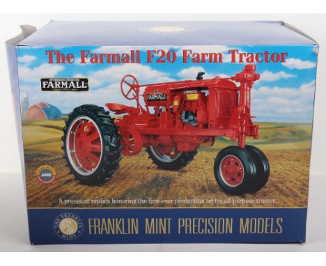 Franklin mint Boxed The Farmall F20 Tractor 1/12 scale model, in near mint condition, was previously displayed, box has edge/