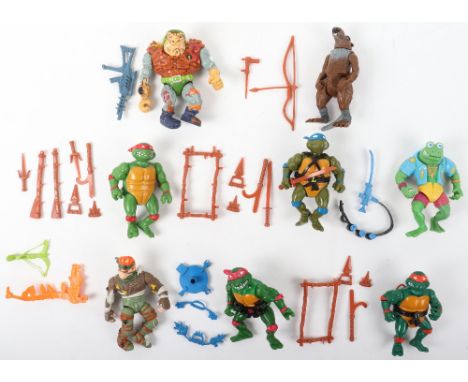 Vintage playmates 1980s Teenage Mutant Ninja turtles figures, including General Traag with one weapon, Genghis frog with weap