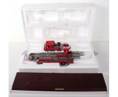 Franklin mint 1965 Seagrave Aerial Ladder Truck 1/32 scale model, in near mint condition, with wooden display stand, was prev