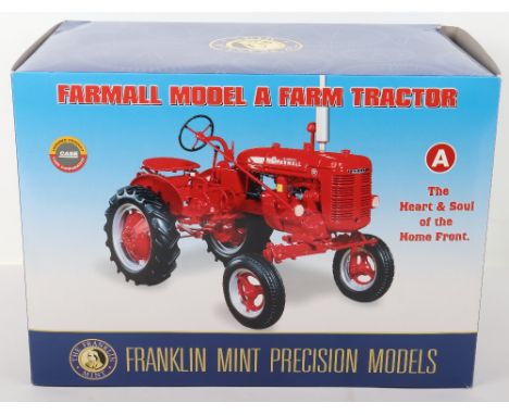 Franklin mint Boxed Farmall model A tractor 1/12 scale model, in near mint condition comes complete and boxed, was previously